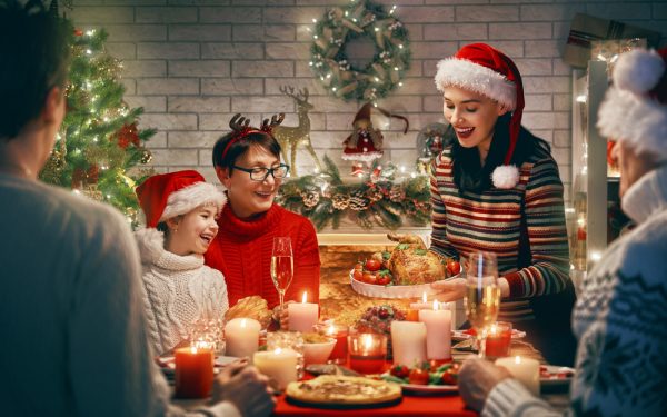 Merry,Christmas!,Happy,Family,Are,Having,Dinner,At,Home.,Celebration