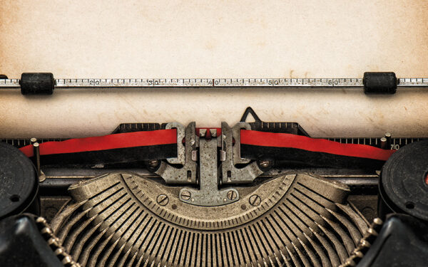 Antique,Typewriter,With,Aged,Textured,Paper,Sheet,With,Space,For