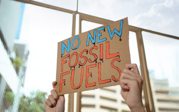 Demonstrator,Protesting,Against,Development,Of,New,Fossil,Fuels