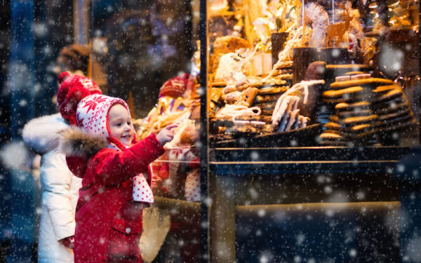 Children,Window,Shopping,On,Traditional,Christmas,Market,In,Germany,On