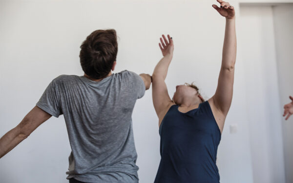 Couple,Dancers,Contact,Hand,Rise,Up,In,Expressive,Movement